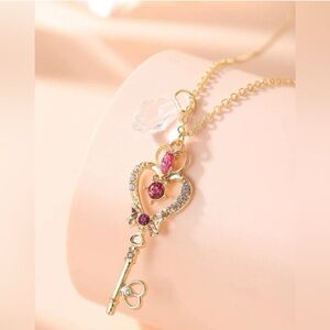 Elegant Gold and Pink Heart Key Pendant Necklace